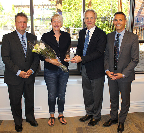 Photo: Lakehead student Whitney Page receives the 2016 Lloyd Dennis Award for outstanding citizenship from (l – r): Lakehead President & Vice-Chancellor Dr. Brian Stevenson, Lakehead Orillia Principal Kim Fedderson, and Lakehead University Board of Governors Chair, Murray Walberg. 