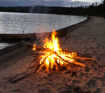 A fire on a beach in North-western Ontario