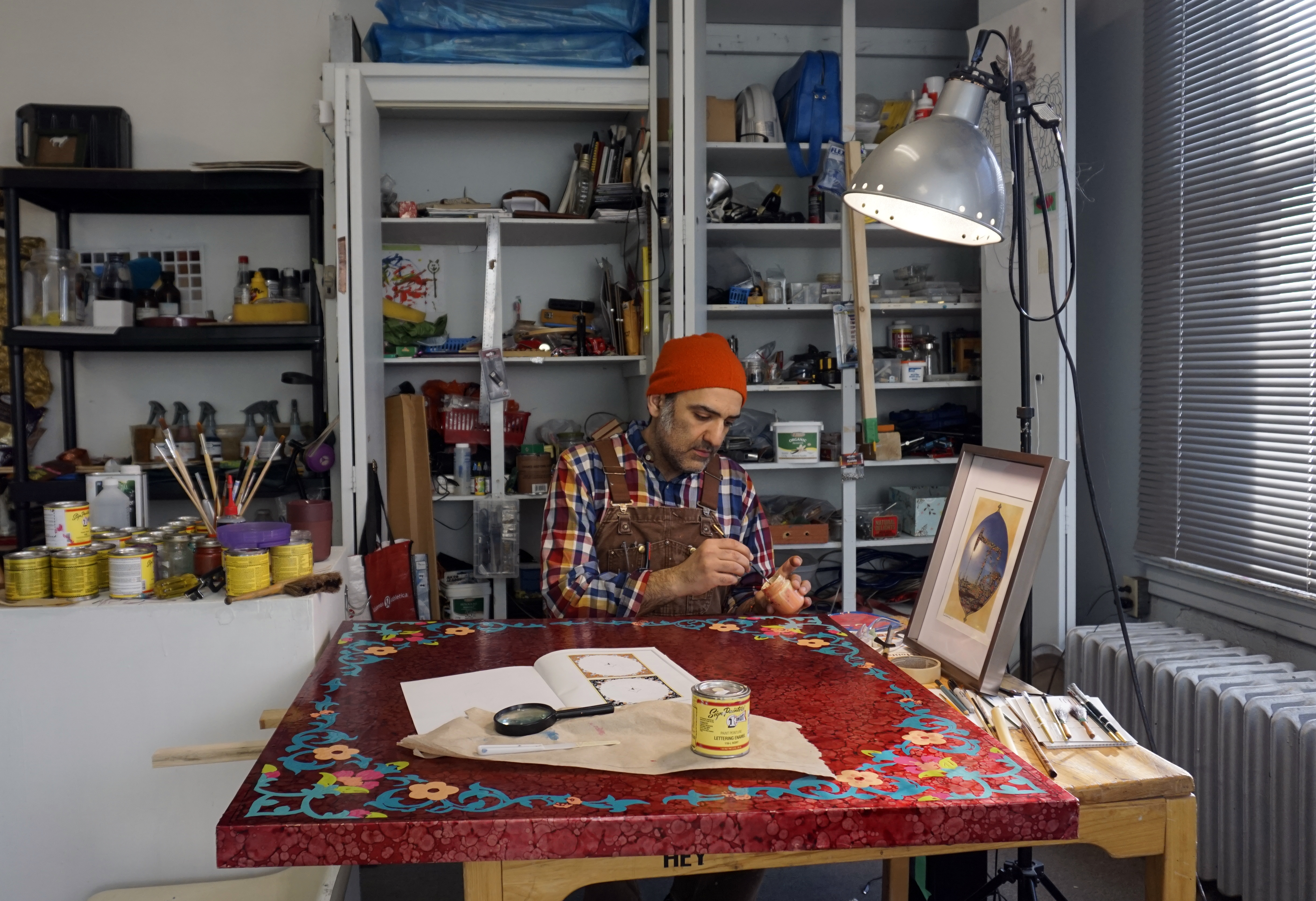 Lakehead University associate professor Sam Shahsahabi, seen here in his studio, is one of 27 artists commissioned to provide artwork as part of the Thunder Bay Art Gallery's Madaabii series.