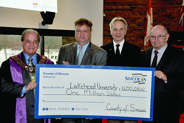 The County of Simcoe makes $1 million contribution to Lakehead University Orillia during County Council. Left to right: Warden Cal Patterson; Dr. Brian Stevenson, President and Vice-Chancellor, Lakehead University; Dr. Kim Fedderson, Dean and Vice Provost, Orillia Campus; and Mr. Bruce Waite, Member of the Lakehead University Board of Governors.
