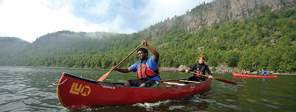 Students canoeing on Lake Superior