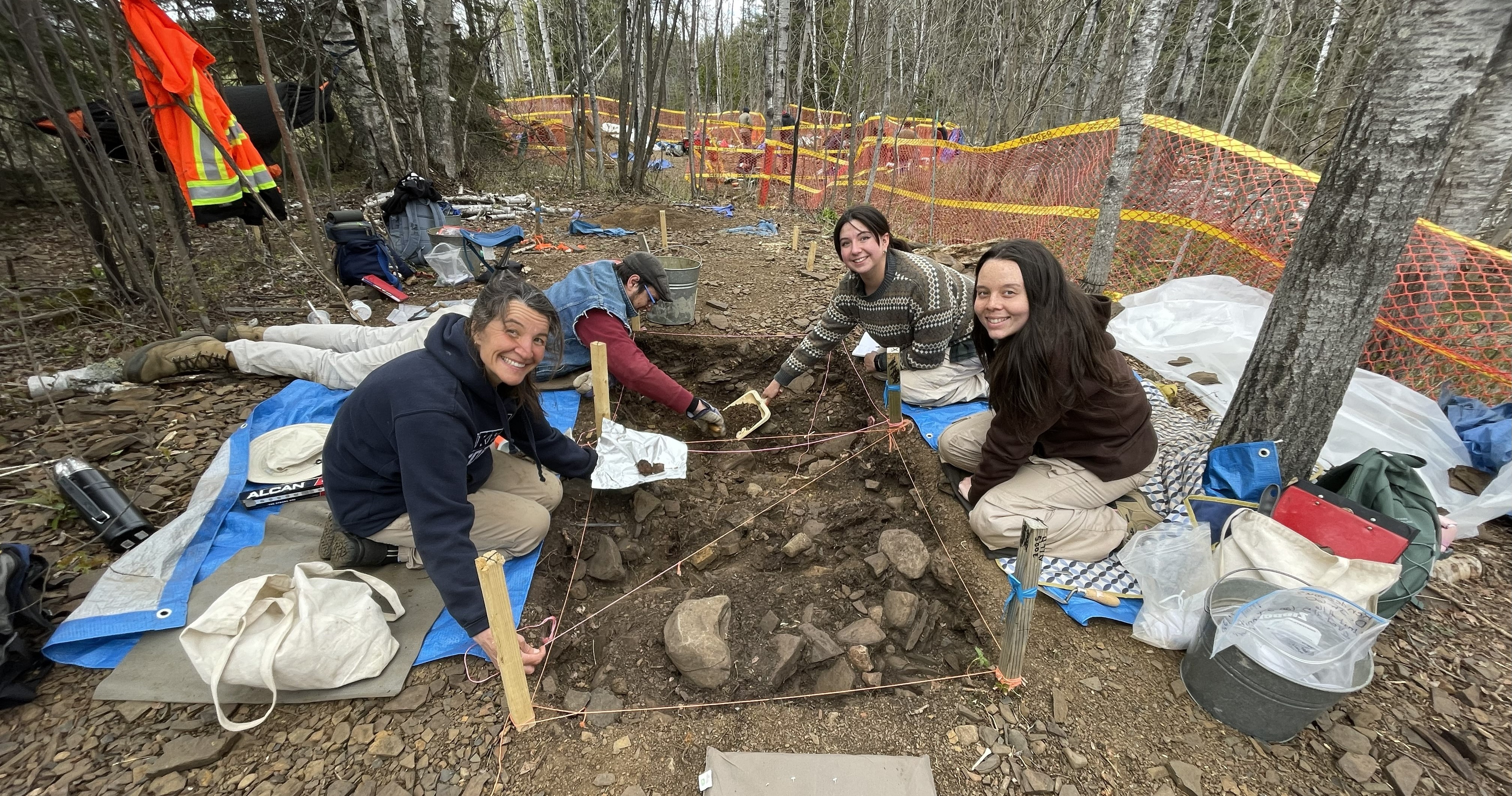 Lakehead students excavate a section of ground during the 2025 Archaeological Field School
