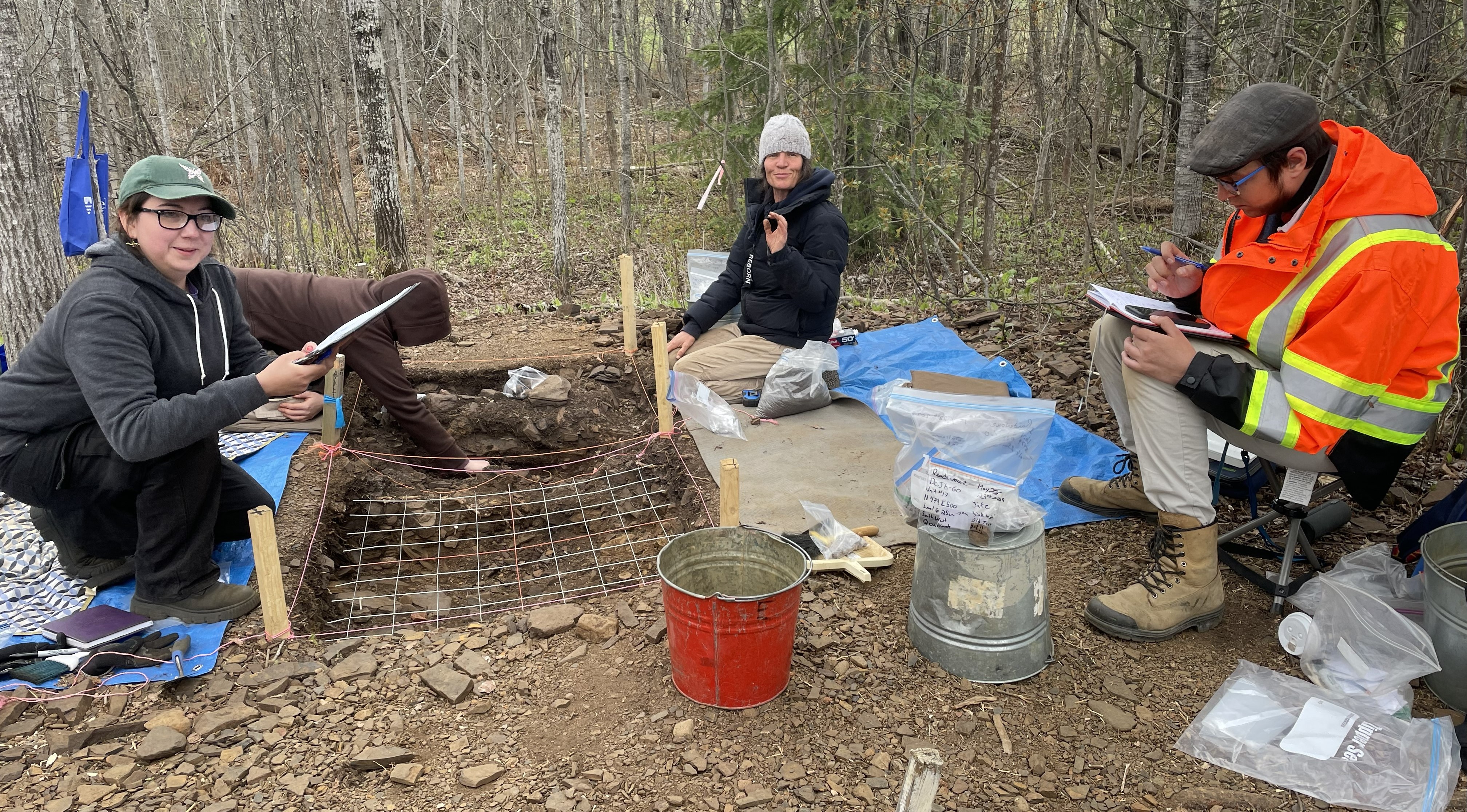 Students excavate using a grid during the 2025 Archaeological Field School