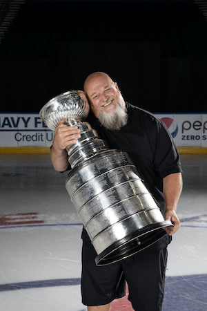 Mike Carlson holding the Stanley Cup
