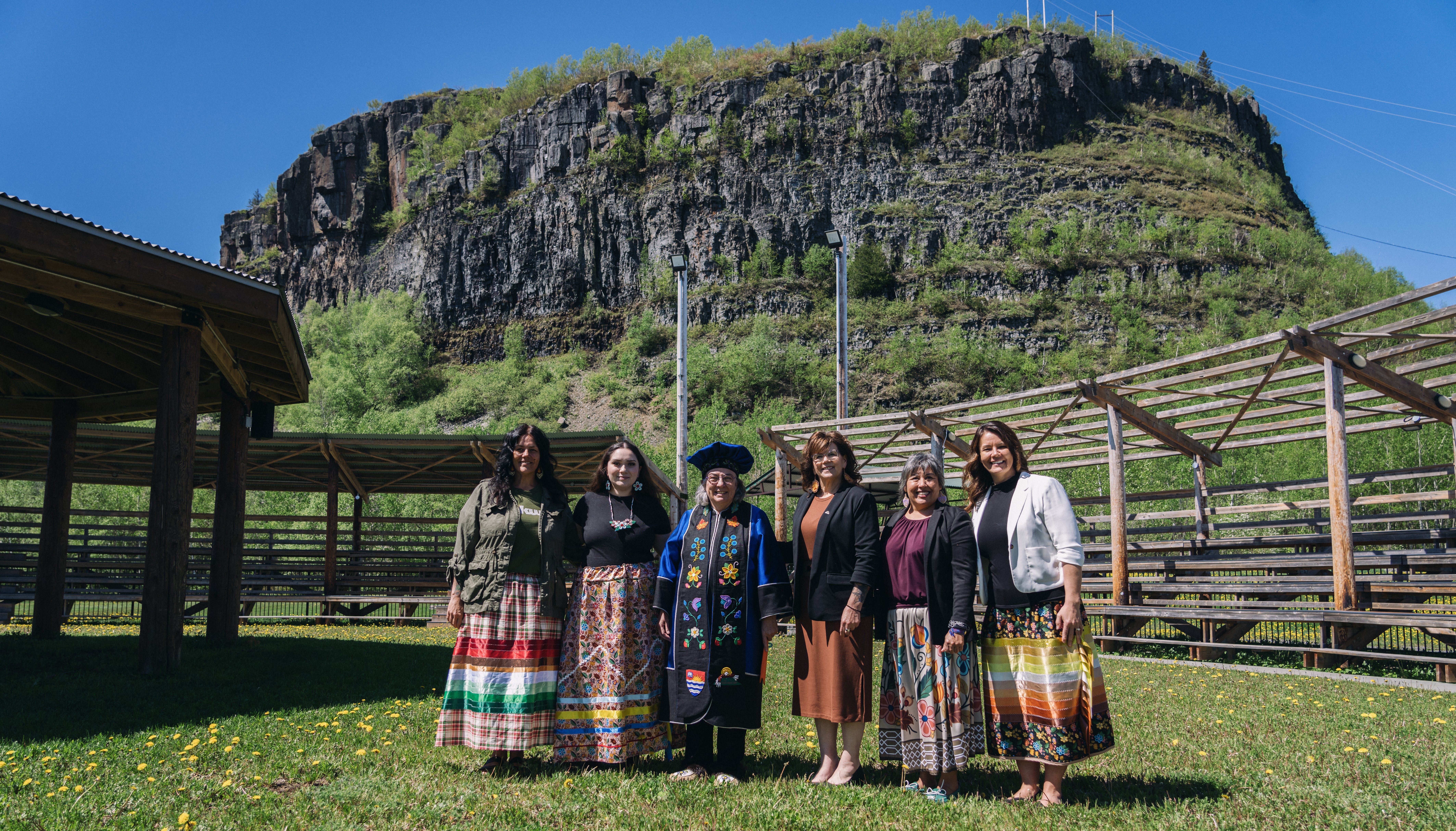 Chief Michele Solomon stands outside with Dr. Gillian Siddall and other participants in Dr. Siddall's presidential installation ceremony