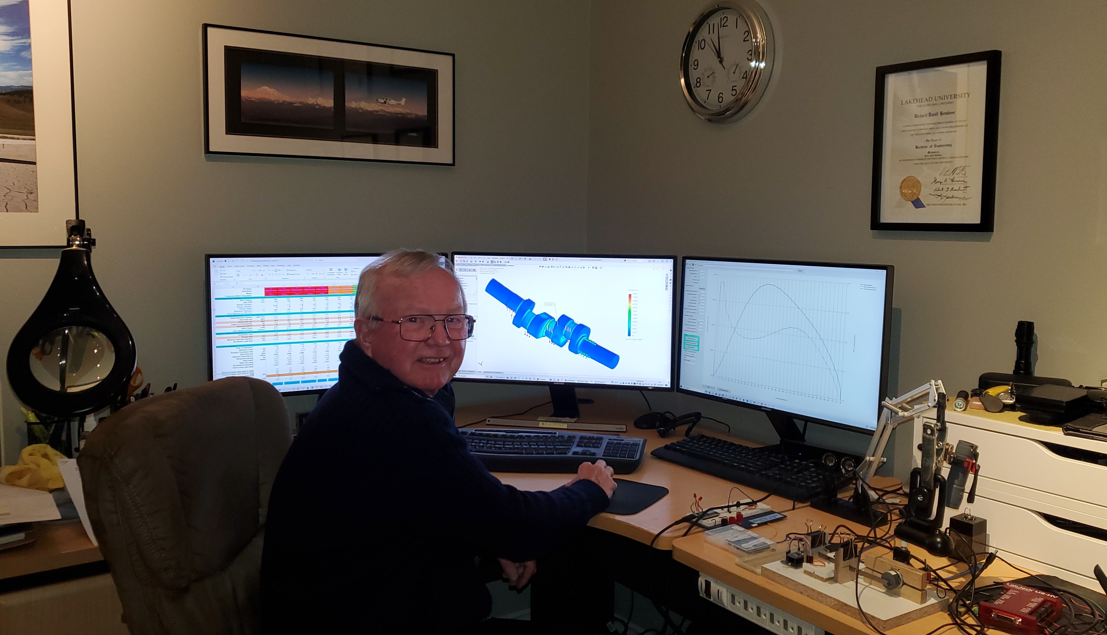 Dick Hembree at Computer Dick Hembree seated in front of a computer in his home office