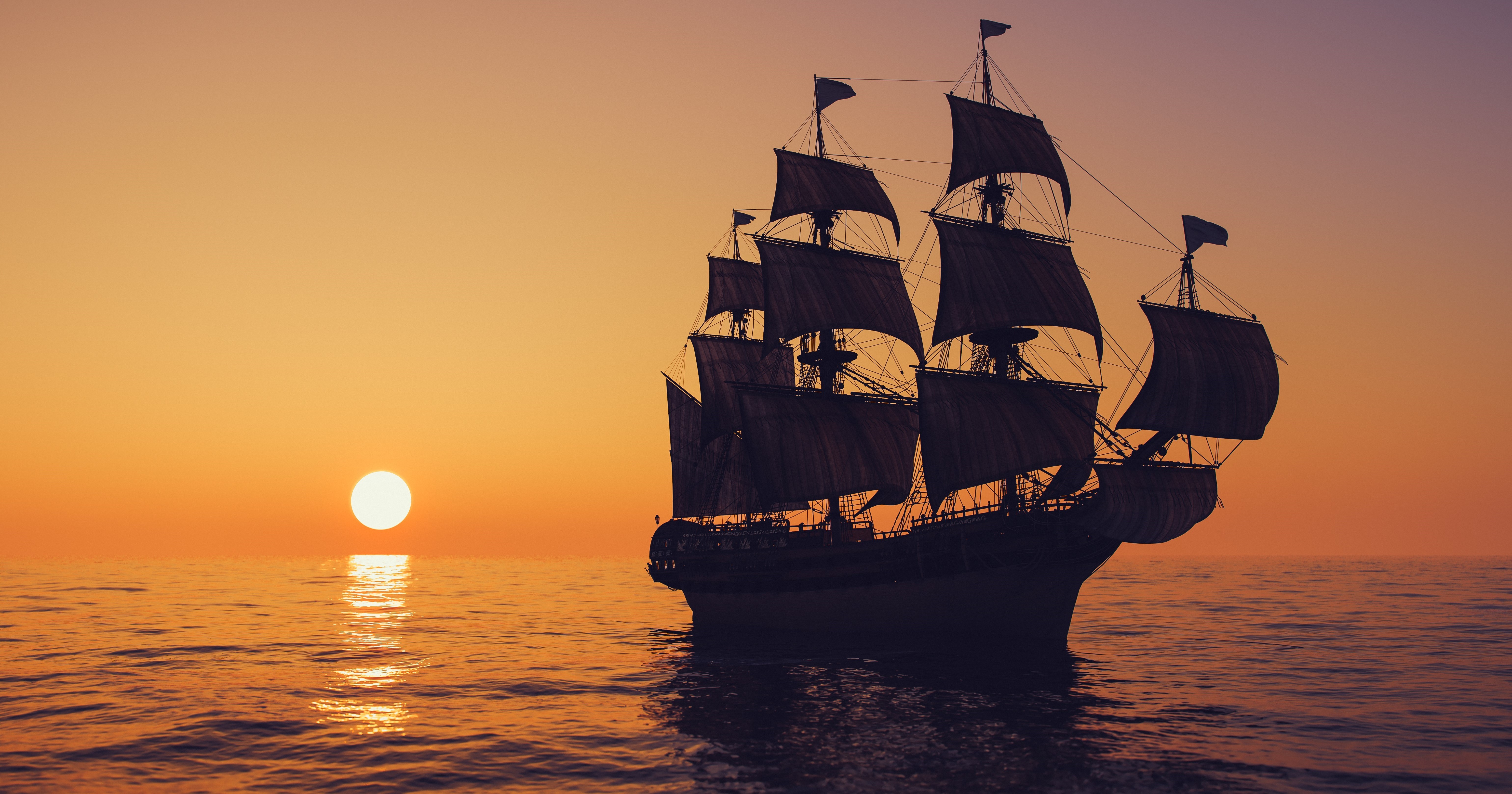 A galleon warship at dawn