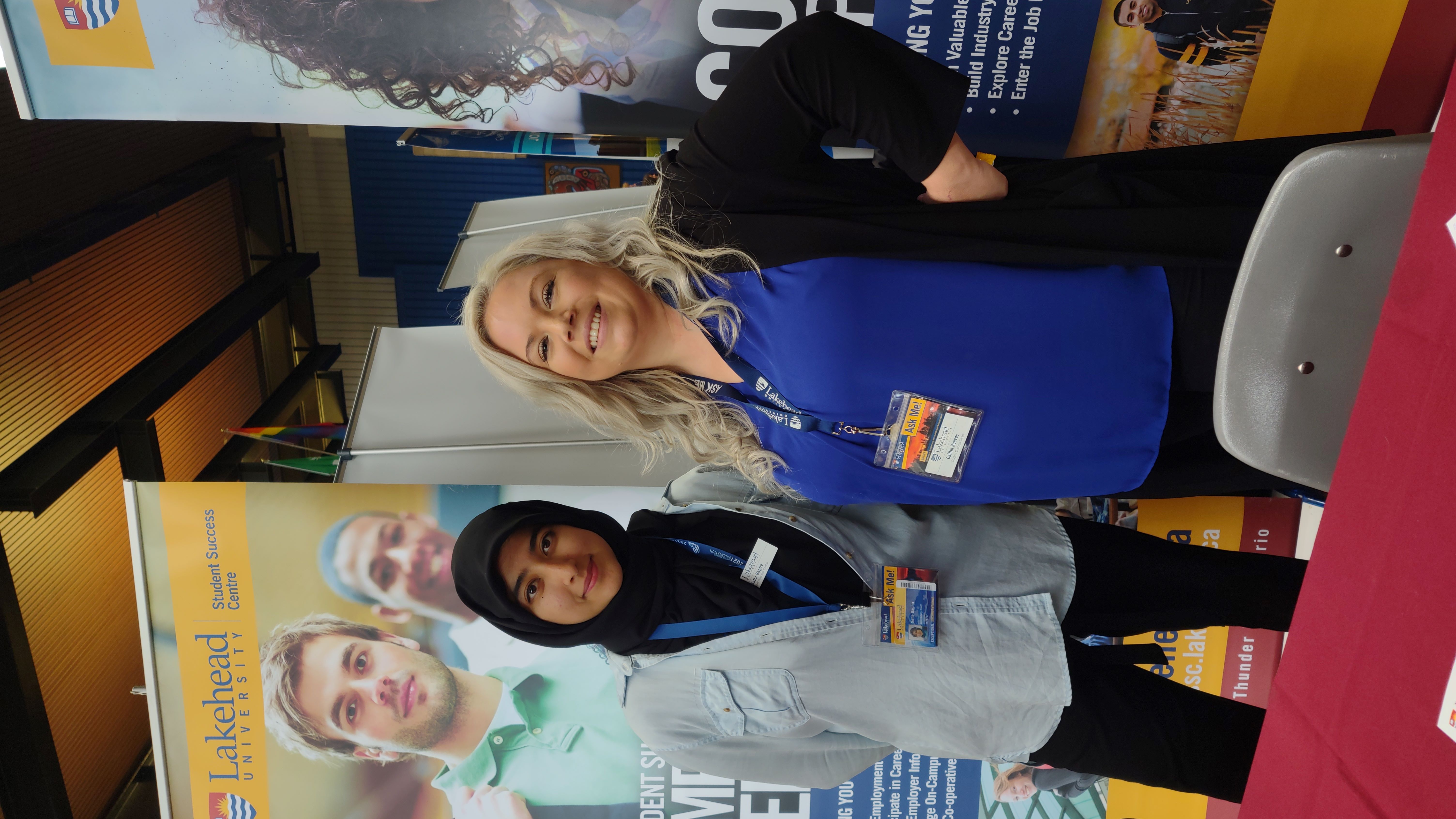 The Co-op Advisor with the Employer Relations Specialist at an event booth