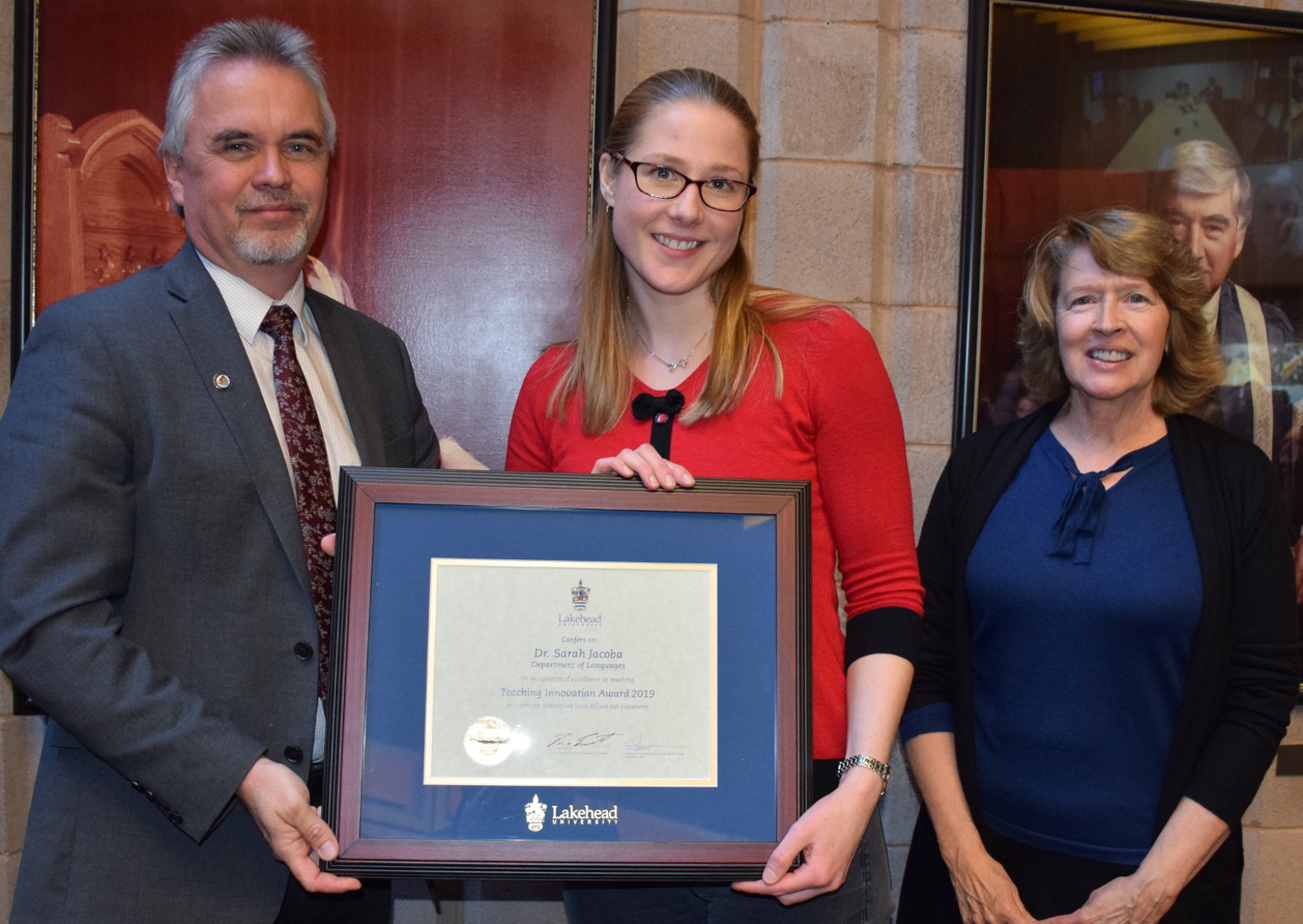 Photo of Dr. Jacoba receiving her award.
