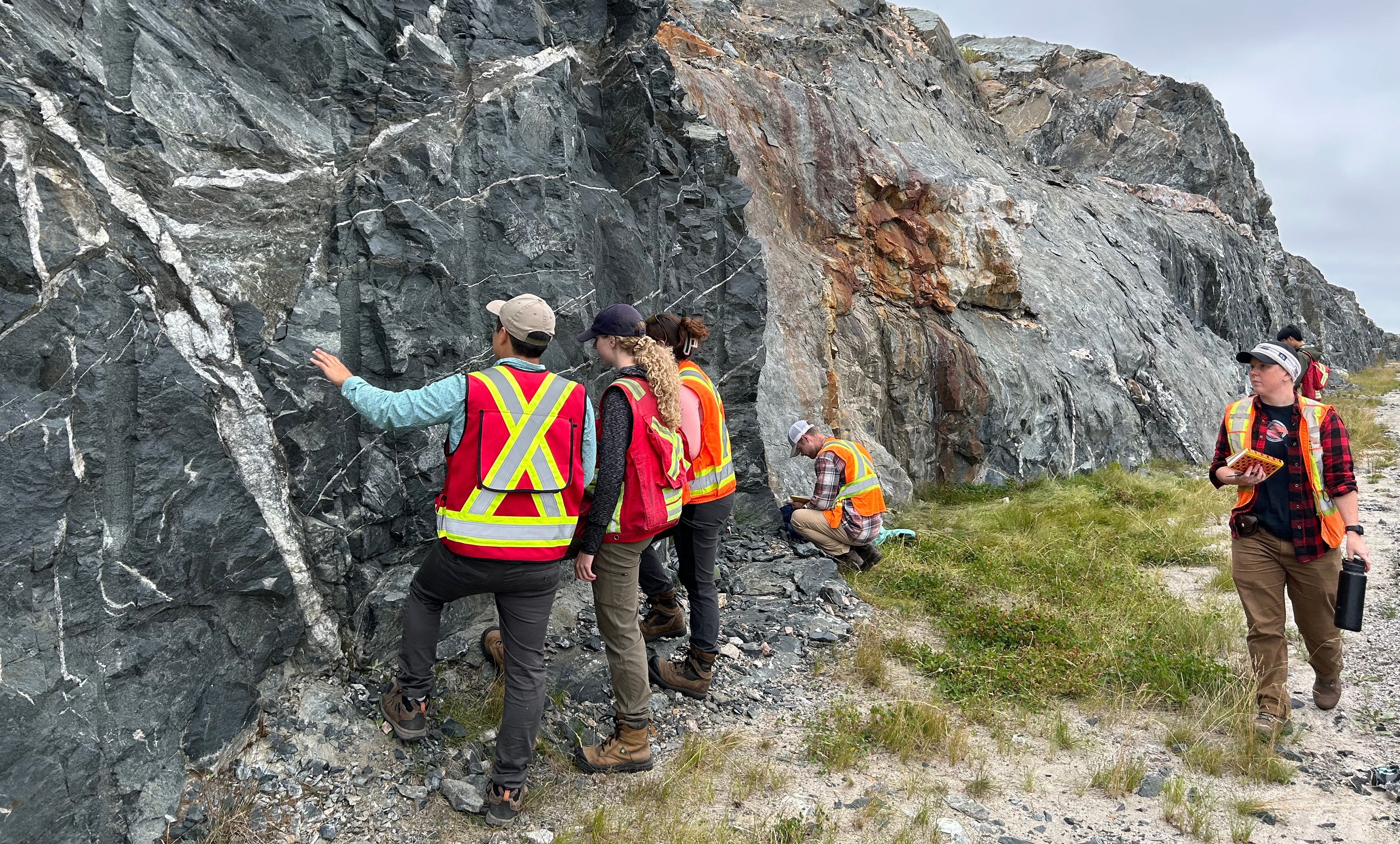 Lakehead Geology Field School Lakehead geology students examine cliff face