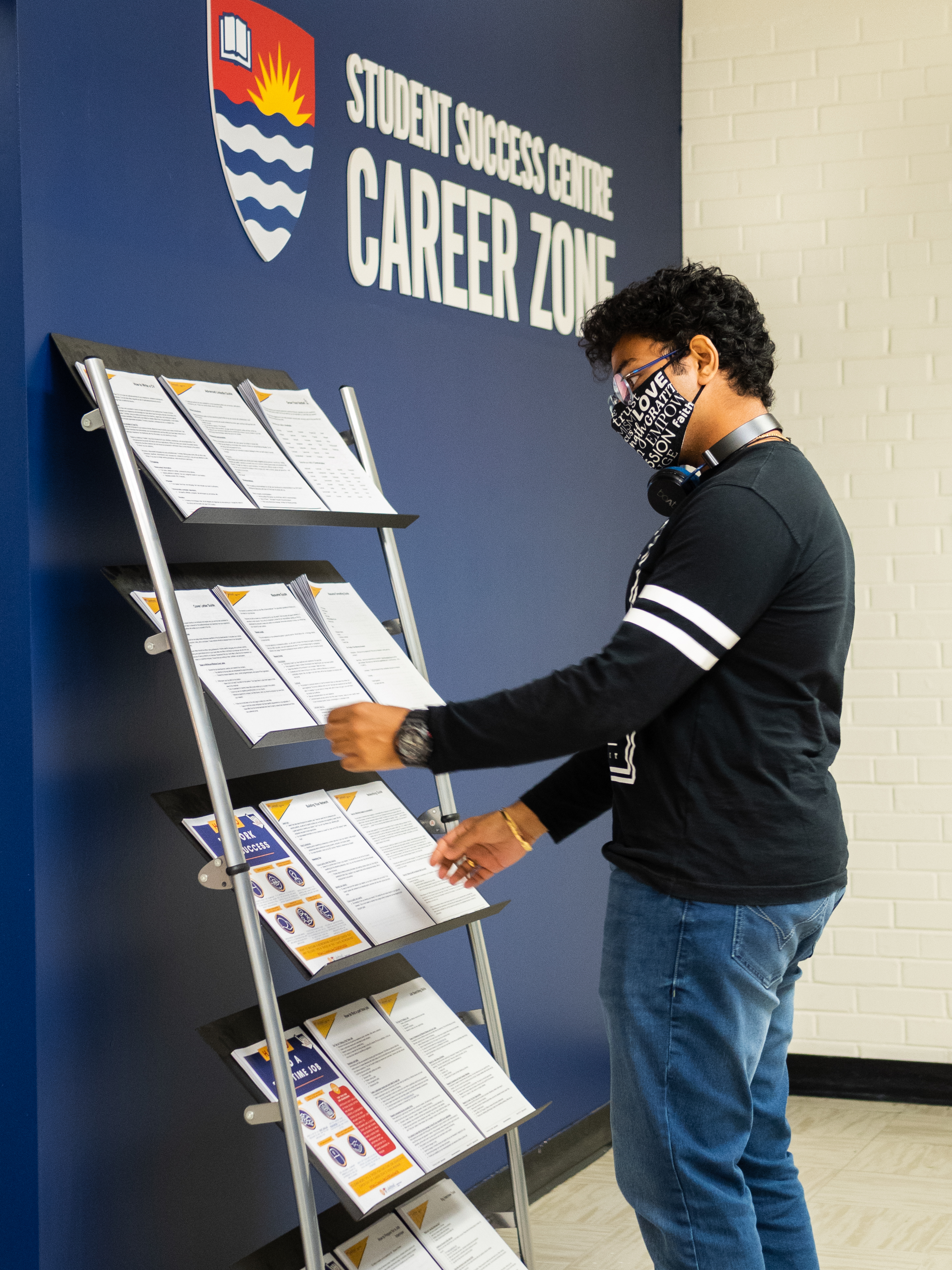 A student views the Career Zones Paper Resources in the tunnels. 