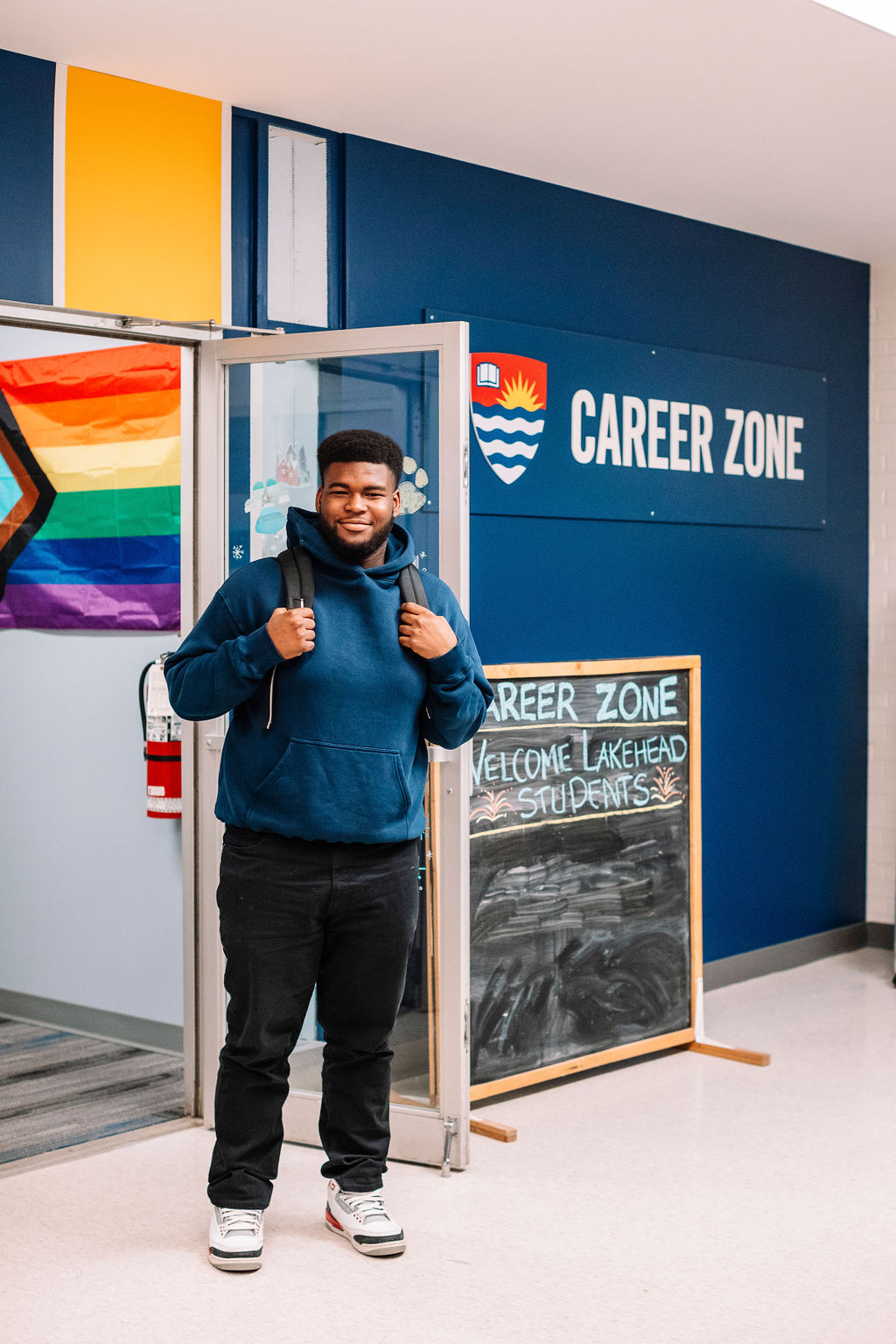 A student standing outside the Career Zone