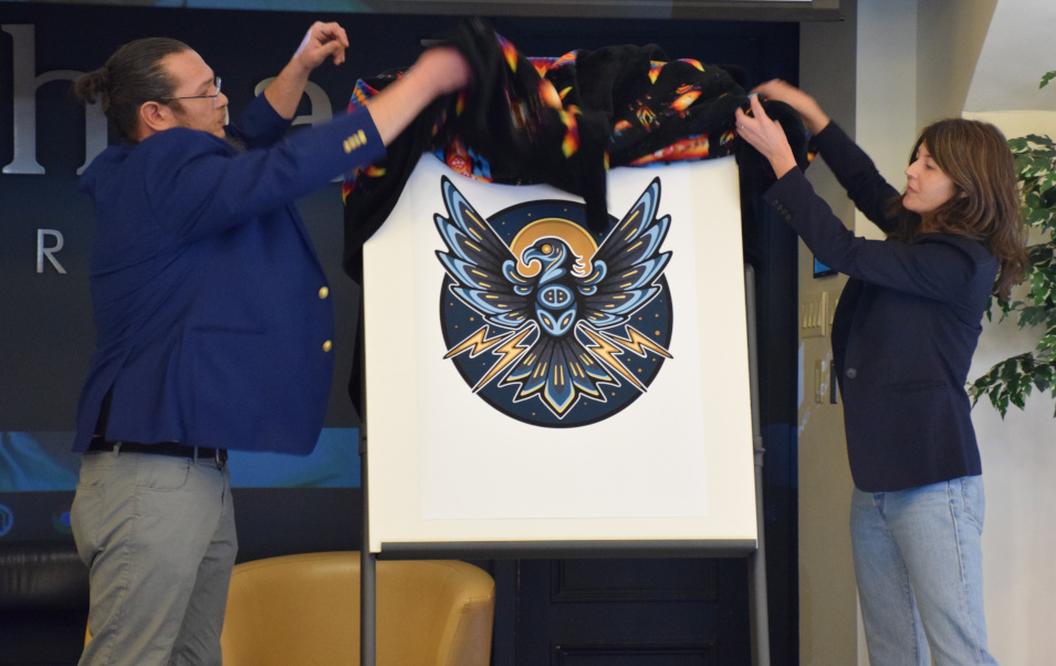 Photo of the logo being unveiled