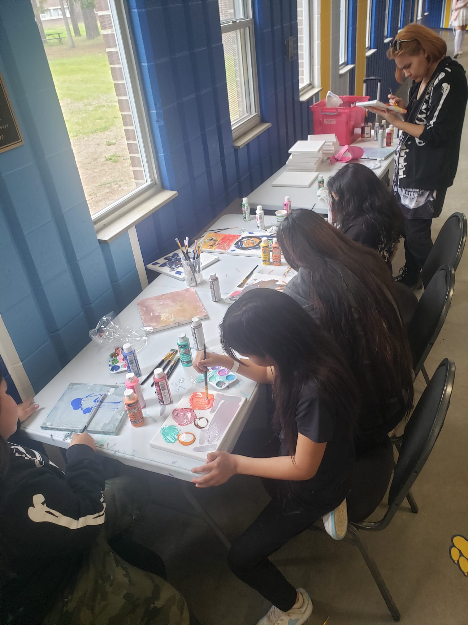 Children Painting Children from Sandy Lake paint pictures at Bartley Residence