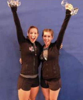 Eilea Given and Kaitlyn Simpson with gold medals