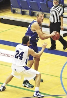Jim Zoet playing basketball