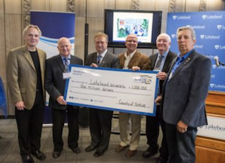 The County of Simcoe presented Lakehead University with a $1 million cheque this morning at an event at Lakehead’s Orillia campus to recognize the County’s support of the University. Pictured (l-r) are: Lakehead Orillia Campus Principal Kim Fedderson, County Council member Bill French; Lakehead University President & Vice-Chancellor Dr. Brian Stevenson; County of Simcoe Warden Gerry Marshall; and County Council members Harry Hughes and John O’Donnell.
