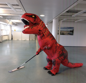 Carmen Pekkarinen dressed up as a T-Rex