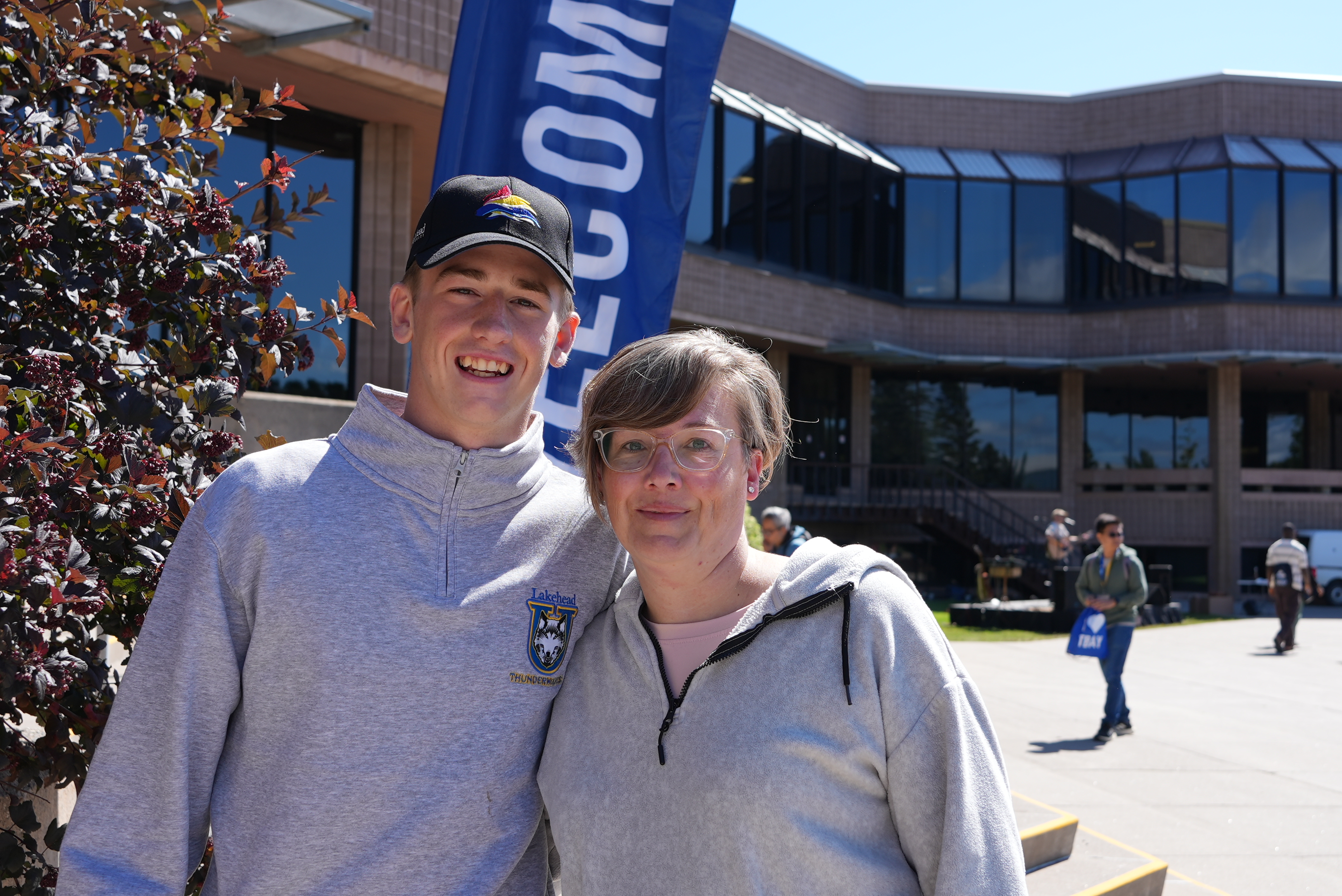 First-year student Owen Dale stands beside his mother Amanda outside of the University Centre