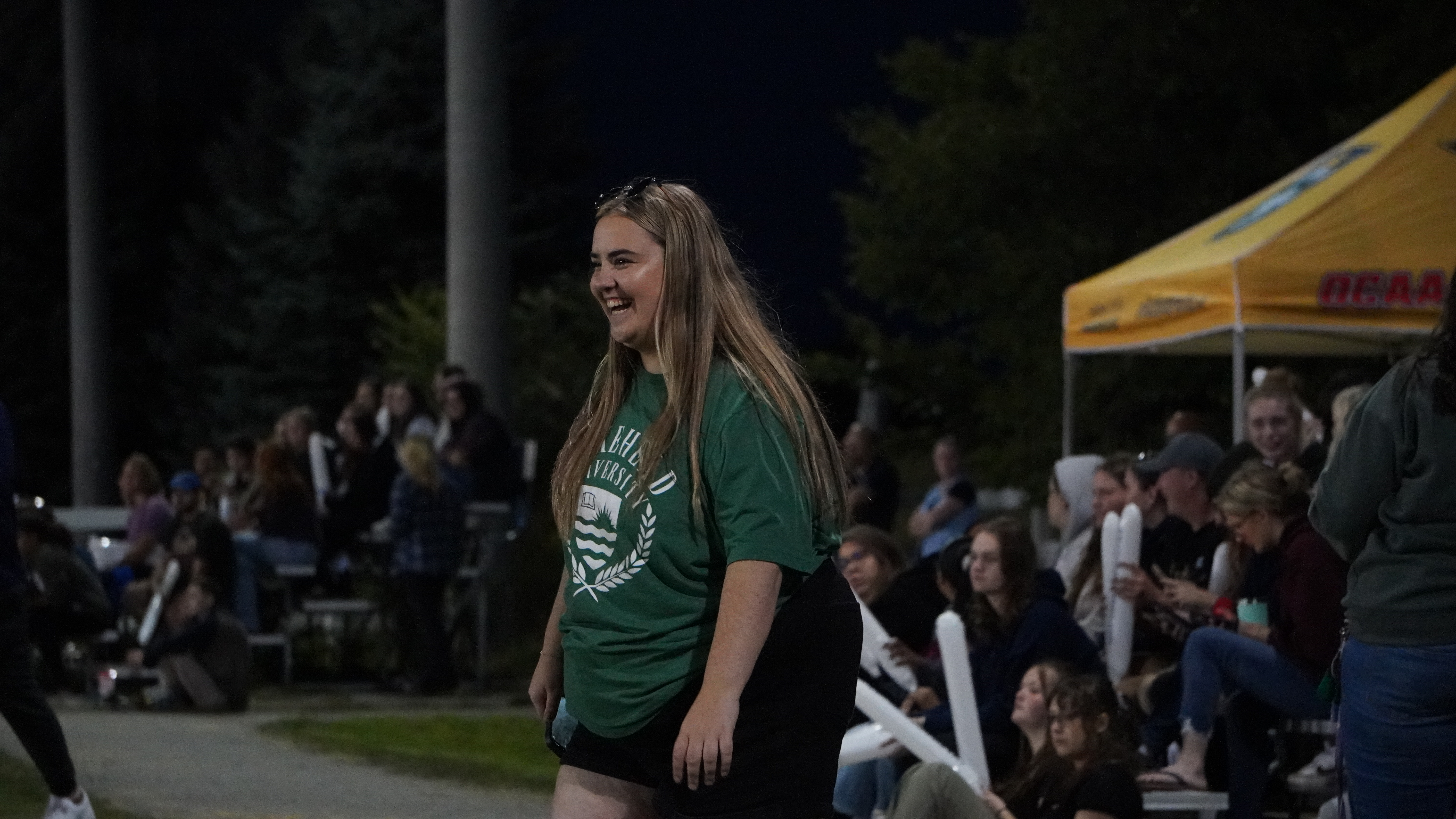 Taliah Lalande stands on the sidelines of a soccer event
