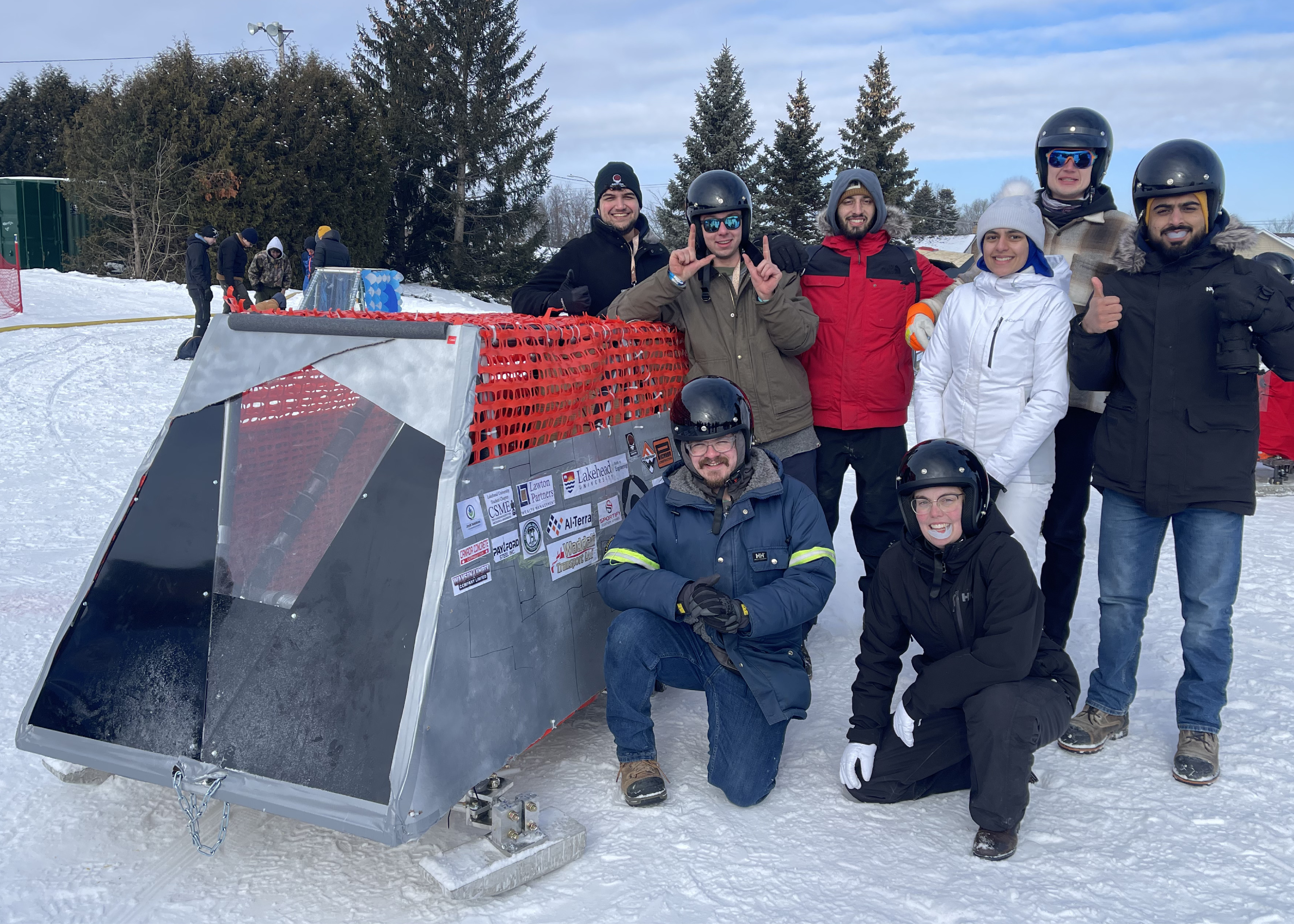 Concrete toboggan with team