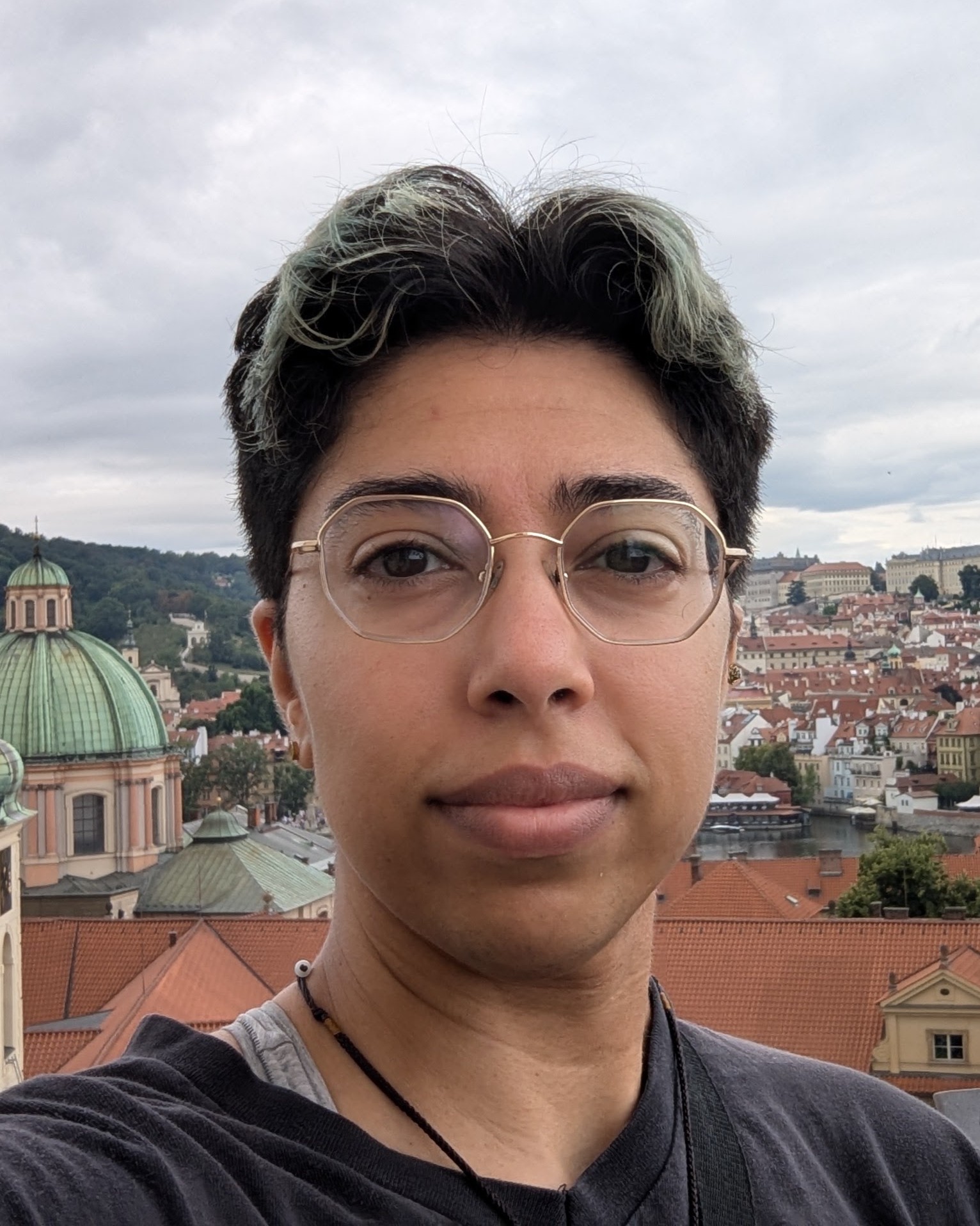 Portrait photo of Sarah somewhere in Europe