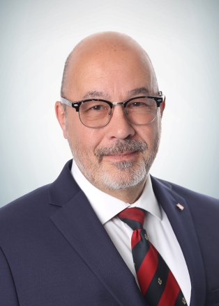 Dr. Claudio E. Pousa