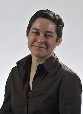 Lakehead Orillia associate professor Dr. Cheryl Lousley posing for a headshot. 