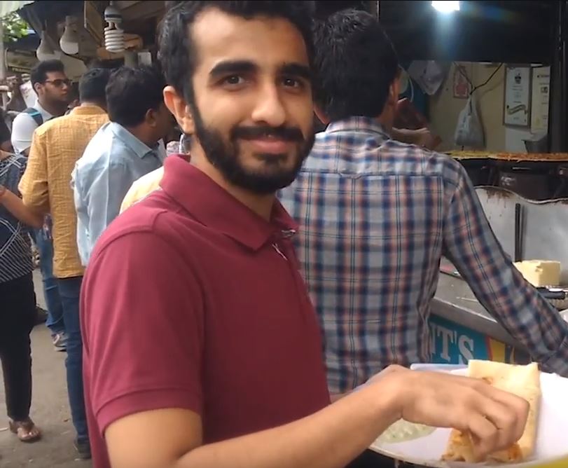 Harsh Kansara eating local street food