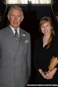 Jocelin standing next to Prince Charles