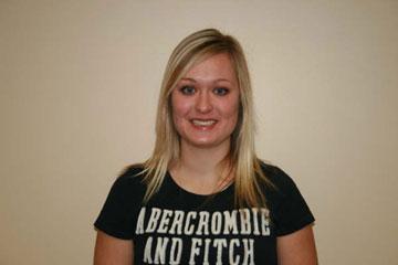 Katie is looking right at the camera