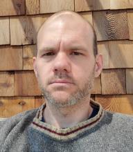 Headshot of Ian Mackay.