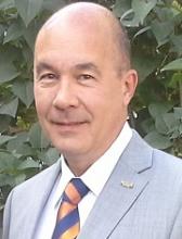 Dr. Claudio E. Pousa