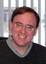 A headshot of Dr. Kevin Crowe