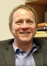 Headshot of Dr. Laurence Fiddick