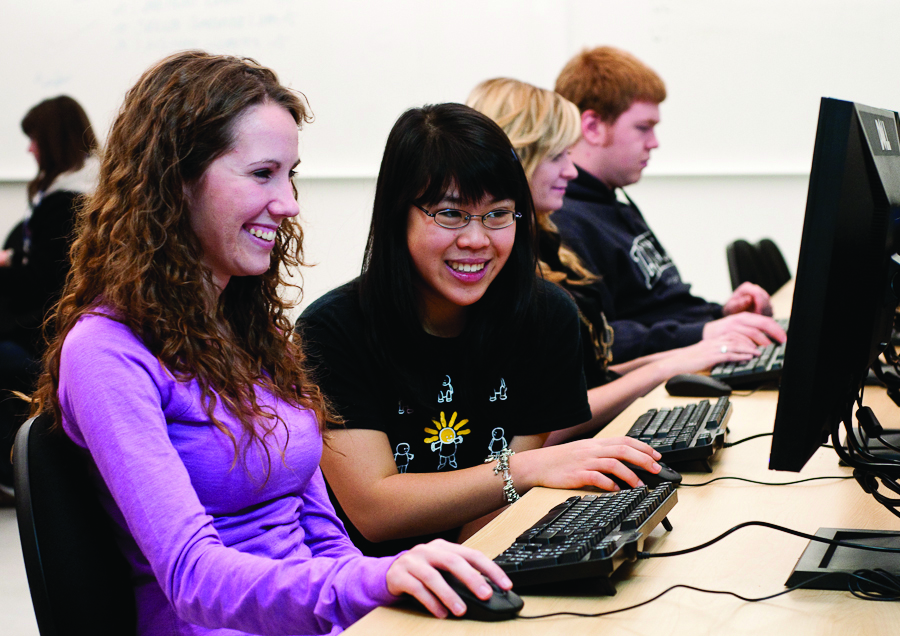 2 students working together at a computer