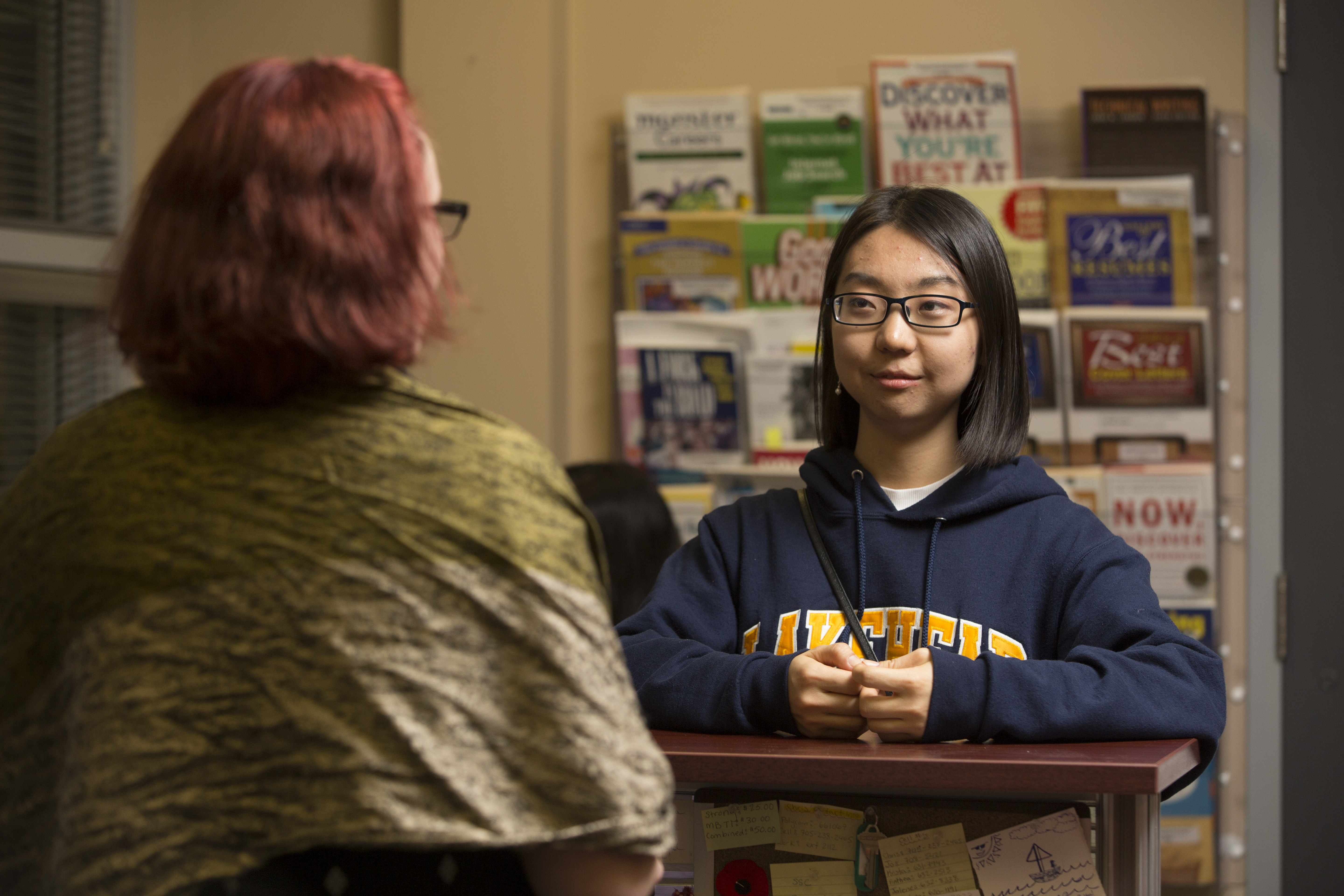 Student getting help from a staff member