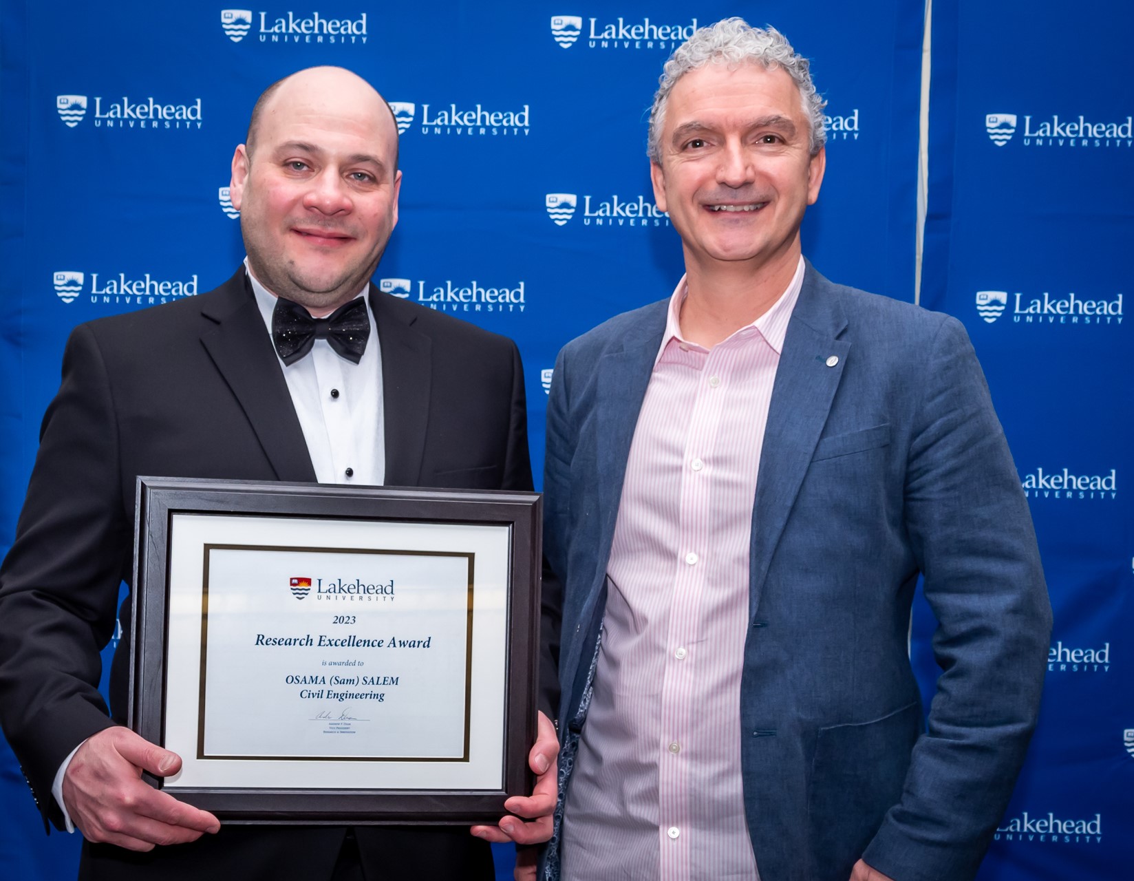Photo of Research Excellence Award Winner (NSERC category), Dr. Osama (Sam) Salem, Department of Civil Engineering, with Dr. Paolo Sanzo, Chair, Senate Research Committee