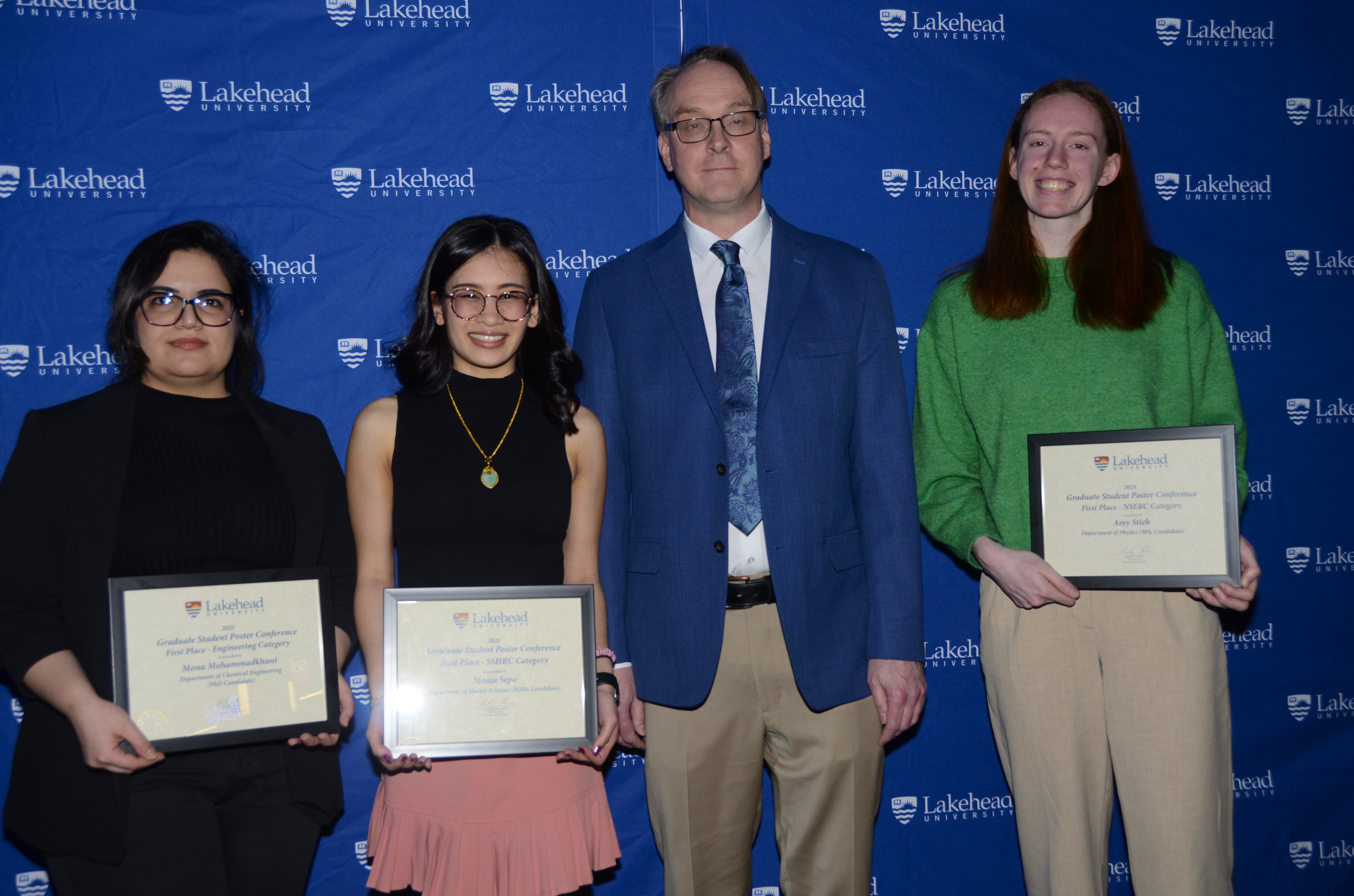 Photo of Graduate Student Conference Poster Winners  with Acting Dean of Graduate Studies