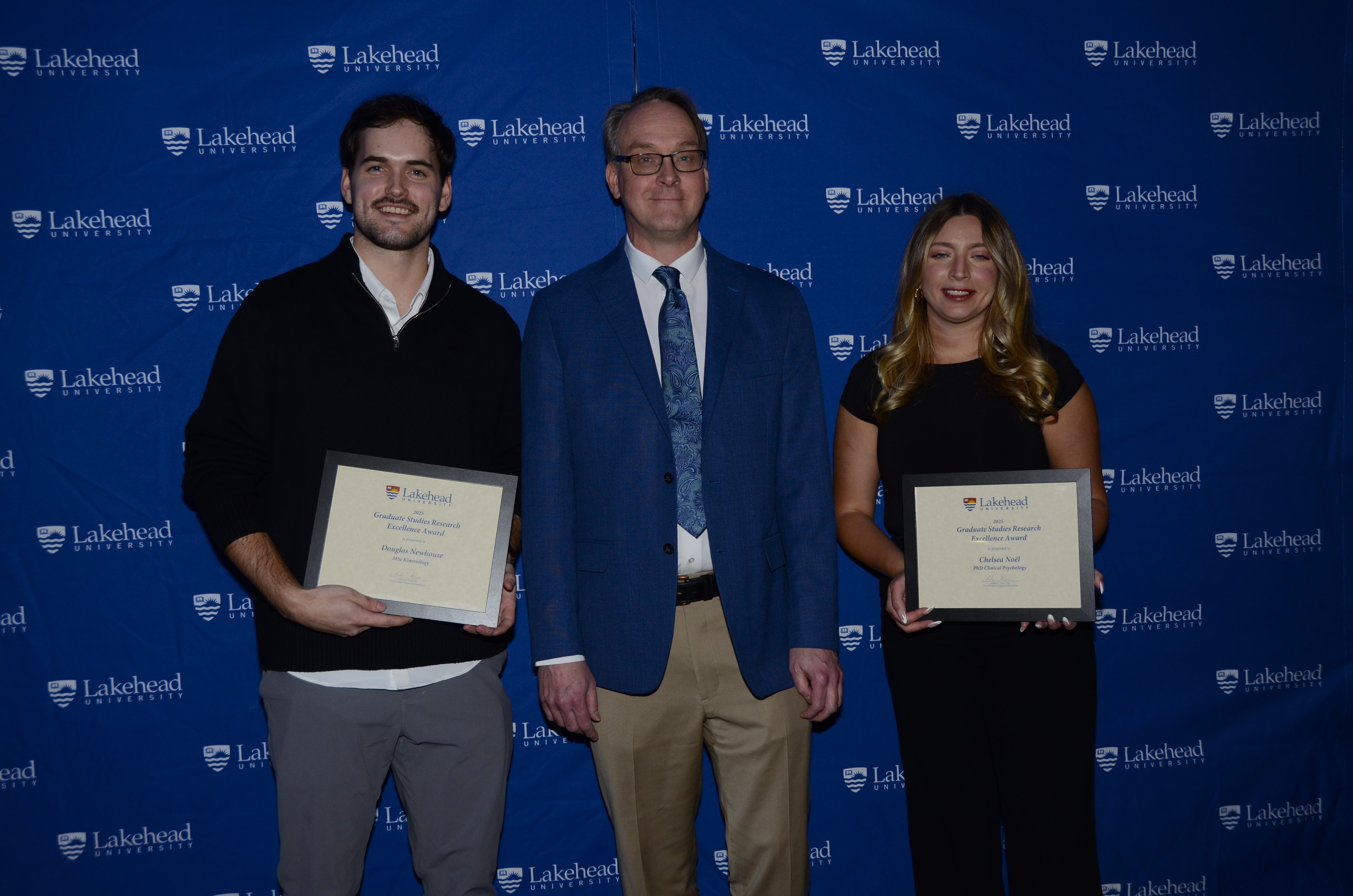 Photo of Graduate Studies Research Excellence Award Winners with Acting Dean of Graduate Studies