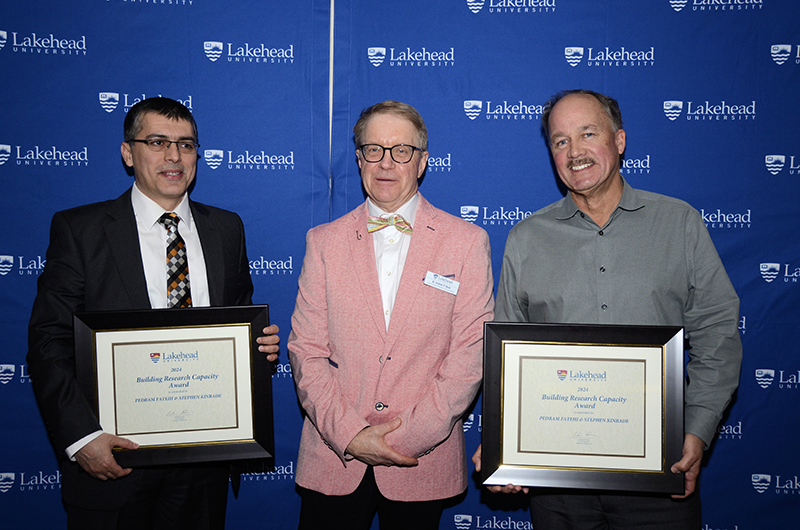 Building Research Capacity Award winners Dr. Pedram Fatehi, Department of Chemical Engineering and Dr. Stephen Kinrade, Department of Chemistry, with Dr. Andrew P. Dean, Vice-President, Research and Innovation