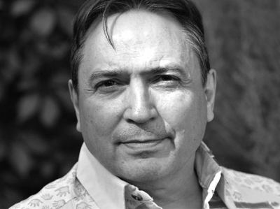 A black and white photo of Chief perry Bellegarde