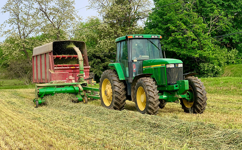 Tractor Harvesting Crop