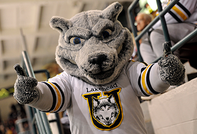Our mascot Wolfie giving the camera two thumbs up