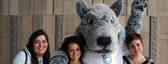 Students posing with wolfie