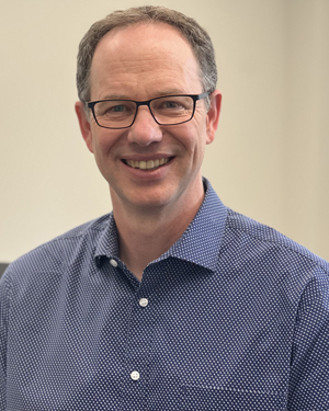 Peter Hickey in an office