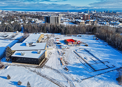 A birds eye view of the construction site for the new CDVMP building in Thunder Bay during the winter