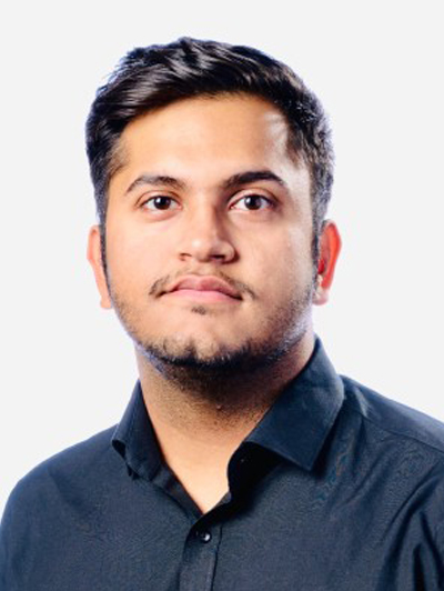 Hash Khilnani smiling for the photo