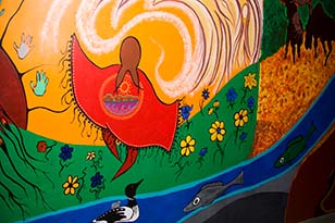 A beautiful mural on the wall depicting indigenous art