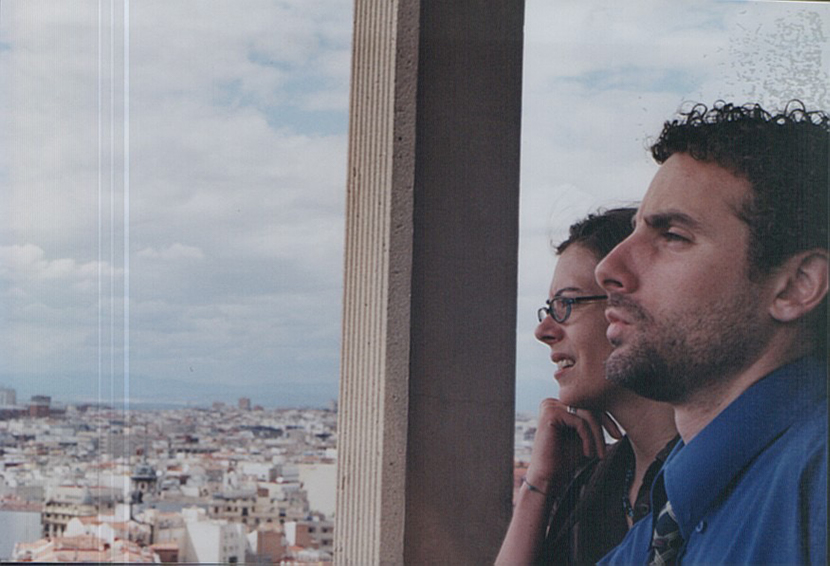 David and his friend Amelie gaze over the rooftops of Madrid where David worked for the Spanish company Quality Telecom.